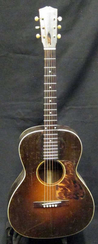 GIBSON ACOUSTIC GUITAR: Flat top; cracks in top body; wear; L-38 1/2", P-F