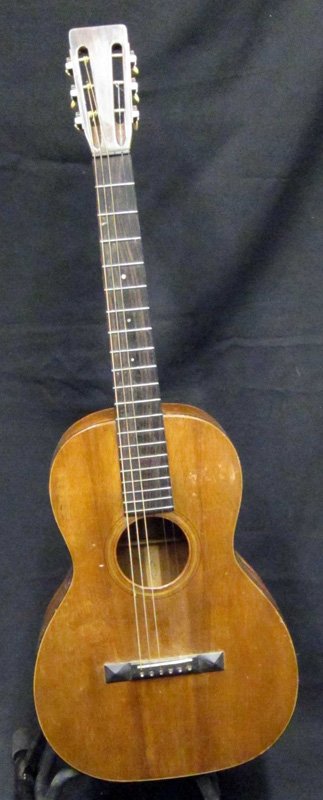 MARTIN ACOUSTIC GUITAR: #18289; finish worn; crack in side; back sanded and punctured; L-38", P