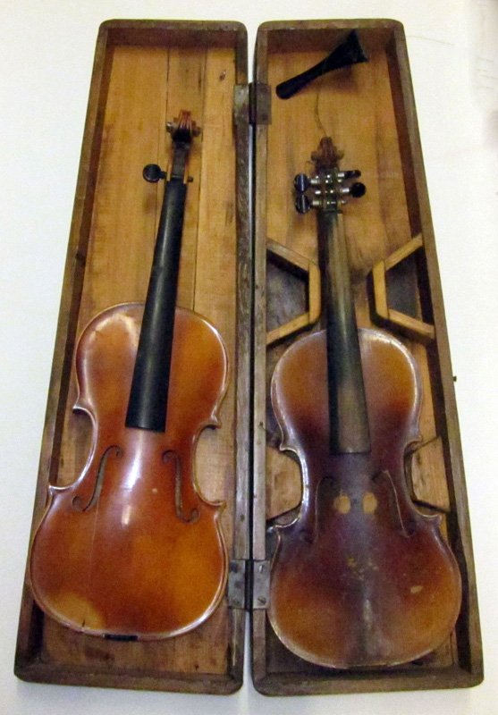 ANTONIUS C. S. VIOLINS (2): Together with hard case and wood case; no bows; check and chips on face, and losses; L-23 1/2", F