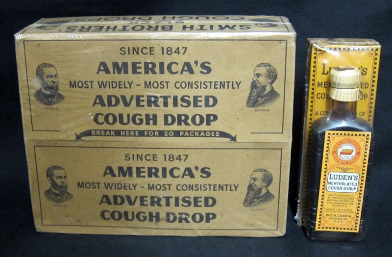LUDENS COUGH PRODUCTS (2): Litho cardboard; (1) Black Cough drop shipping box; (1) mentholated cough syrup; boxes: edges/corners are slightly rough; some minor creasing; some spotting; Longest L-9", VG-EX