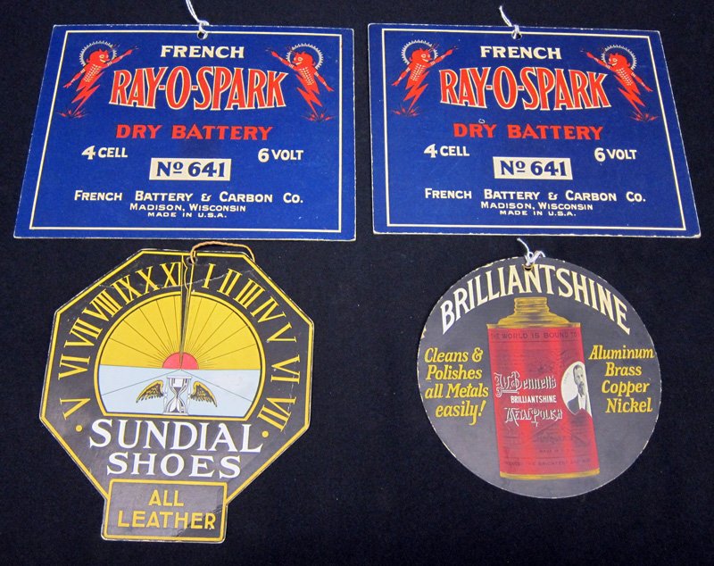 ADVERTISING HANGING SIGNS (4): Litho cardboard; (1) Brilliantshine - metal polish, double sided; (1) Sundial Shoes - double sided, creased; (2) Ray-o-Spark Dry Battery - single sided; largest 6 1/2" x 8 1/2", G-VG