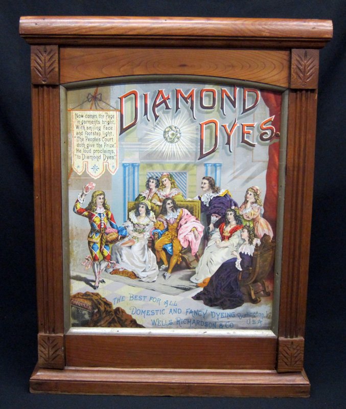 DIAMOND DYE CABINET: Counter-top; litho tin front panel; oak or chestnut case with double door back; minor blemishes; H-27", VG-EX