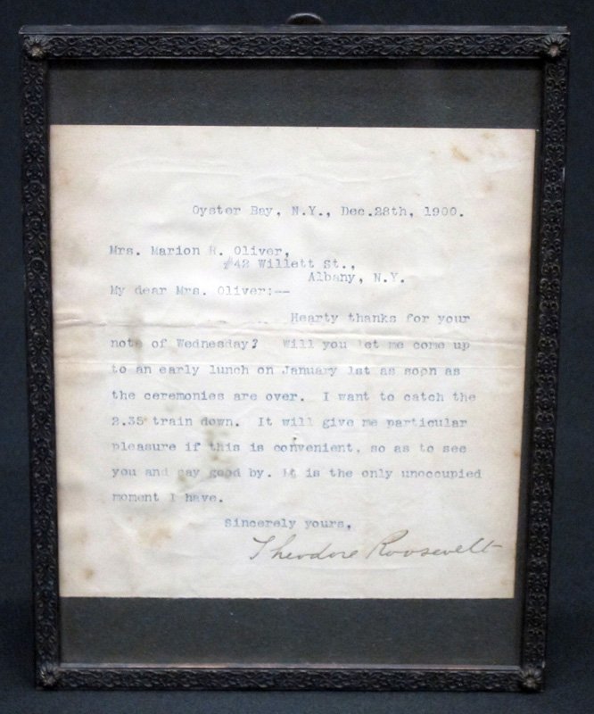 THEODORE ROOSEVELT AUTOGRAPH: Typed signed letter from Oyster Bay, dated Dec. 28th 1900; Roosevelt wishing to see Mrs. Marion Oliver before he leaves (?); framed; paper toned; 6" x 6", G