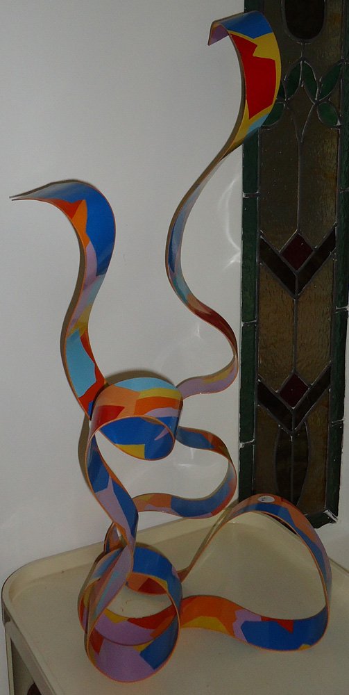 Table Sculpture: Whimsical, multi-colored wavy ribbon form; signed Dorothy Gillespie 1981 H-27"