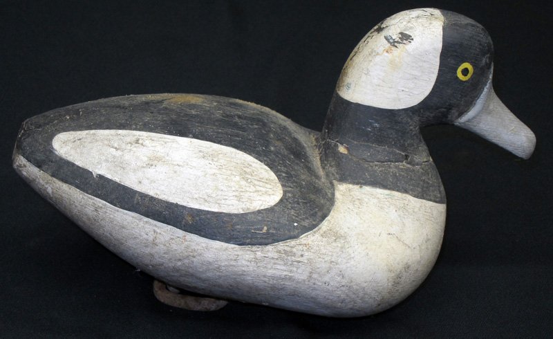 BUFFLE HEAD DECOY: Carved and painted wood; Jim Wright; neck cracked at base; Provenance: Fleckenstein Estate; L-9 1/2", G-VG