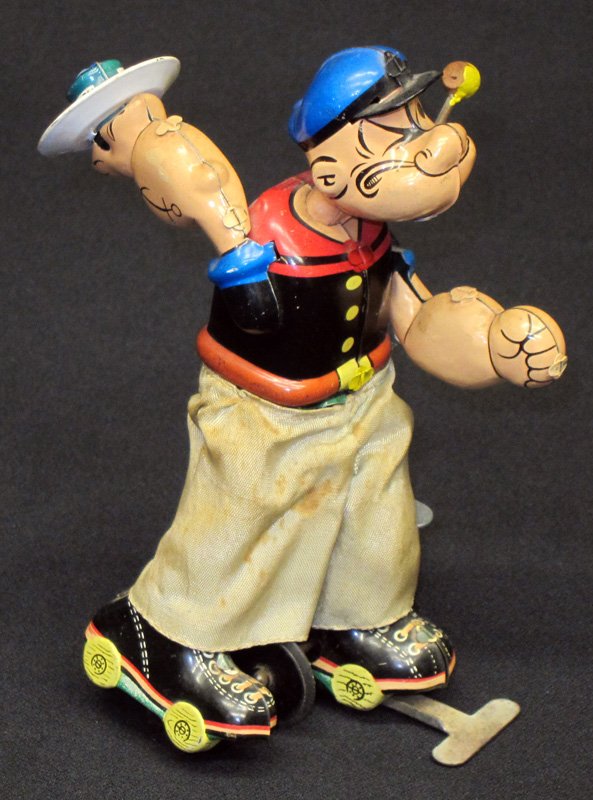 LINEMAR POPEYE SKATER: Litho tin and cloth; mechanical; working; pants soiled; H-6 1/2", G-VG