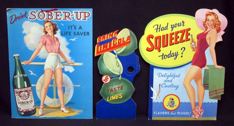 SODA DIE-CUT SIGNS (3): Litho cardboard; (1) Squeeze: easel back; (1) Sober Up: easel back; (1) Lime Cola: bottle holder; tallest H-20", VG-EX