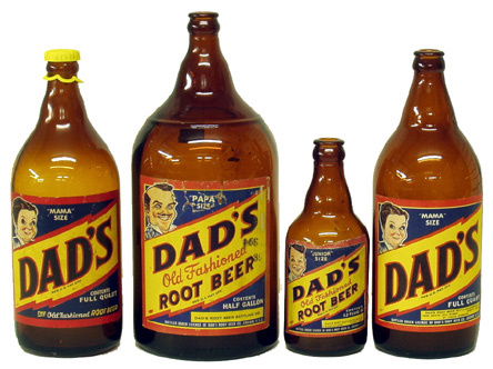 LOT OF DAD'S ROOT BEER BOTTLES: (1) Half gallon bottle, (2) quart bottles, (1) 12 oz bottle,(1)"Junior Size" 6-pack with wear to carrier; (1)"King Size" 6-pack; (1)"Papa", (1) "Mama",(2)"Junior",(1)"Big Jr" H-7"-11", G-VG.