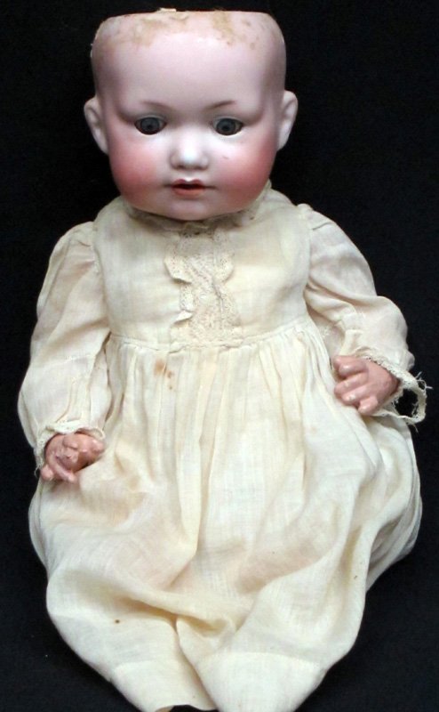 A. M. BISQUE CHARACTER BABY: 3 971 267/1; sleep eyes; open mouth; jointed composition body; dressed; missing wig; H-12", G