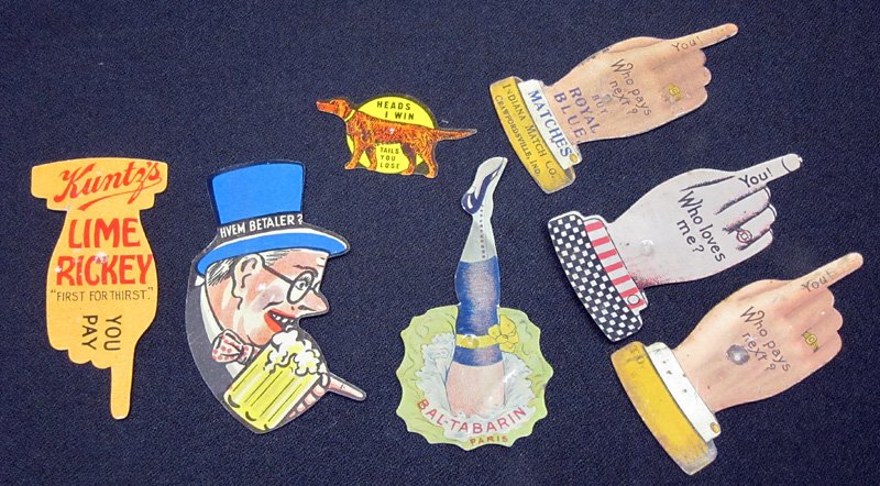 ADVERTISING SPINNERS (7): Figural litho tin, die-cut; some with wear and scratches; L-2 3/4", G-VG