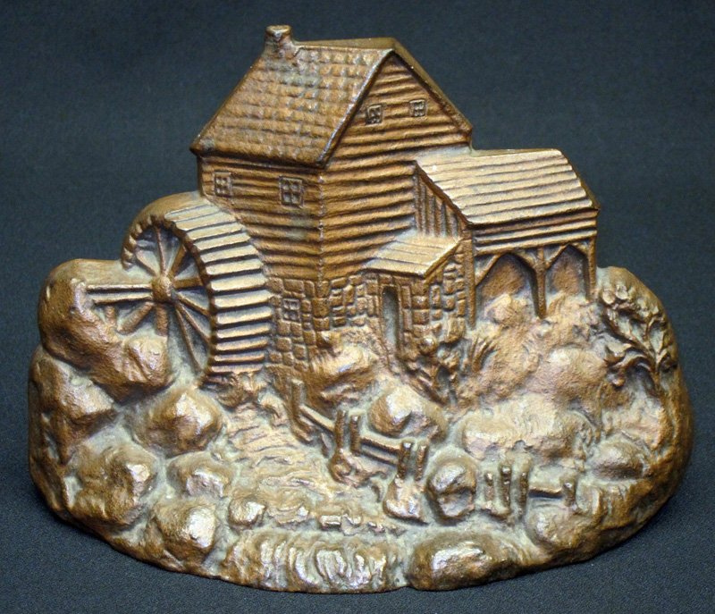 OLD MILL DOORSTOP: Grenier Novelties; painted cast iron; L-9", G-VG