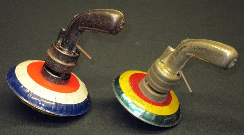 PISTOL LAUNCHER TOPS (2): Litho tin; (1) working; wear; L-5", F-G