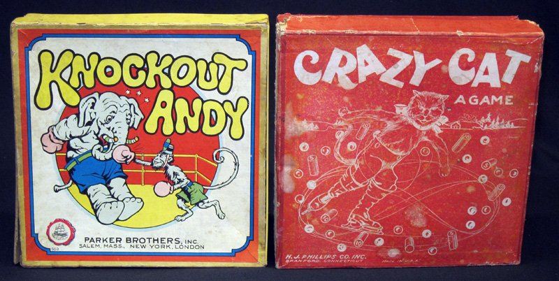 TOP GAMES (2): Original boxes; (1) Knockout Andy: skittles type game, missing pins, Parker Bros.; (1) Crazy Cat: H. J. Phillips, skittles variation game; boxes rough; box L-8", G