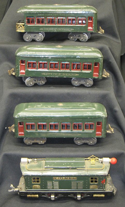 LIONEL TRAIN NYC: Painted metal; #253 engine, (2) Pullman cars; (1) observation car; untested; wear; L-32", F-G