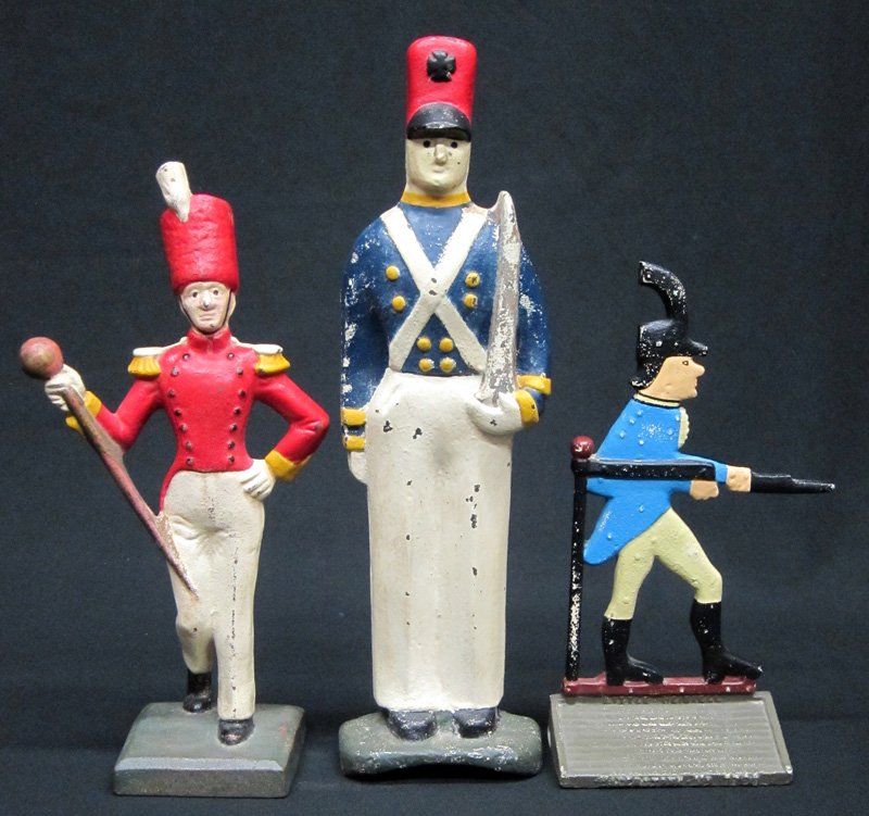 CAST IRON DOORSTOPS (3) (1 of 1)