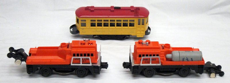 LIONEL ACCESSORIES (3): (2) Track cleaning cars #3927, missing tanks; (1) Lionelville Rapid Transit, faded; L-7", G
