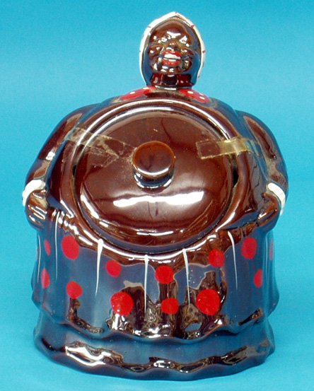 Black Americana ROCKINGHAM 60'S MAMMY COOKIE JAR: "Laughing Mammy" with lid in belly; H-8 1/2", EX.