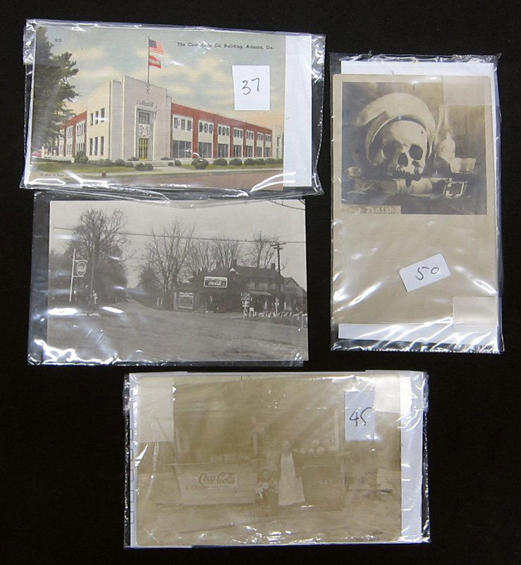 COCA-COLA POSTCARDS (4): (2) Photographs of store front; (1) Coca-Cola Atlanta; (1) unusual photo with Coca-Cola bottle; G