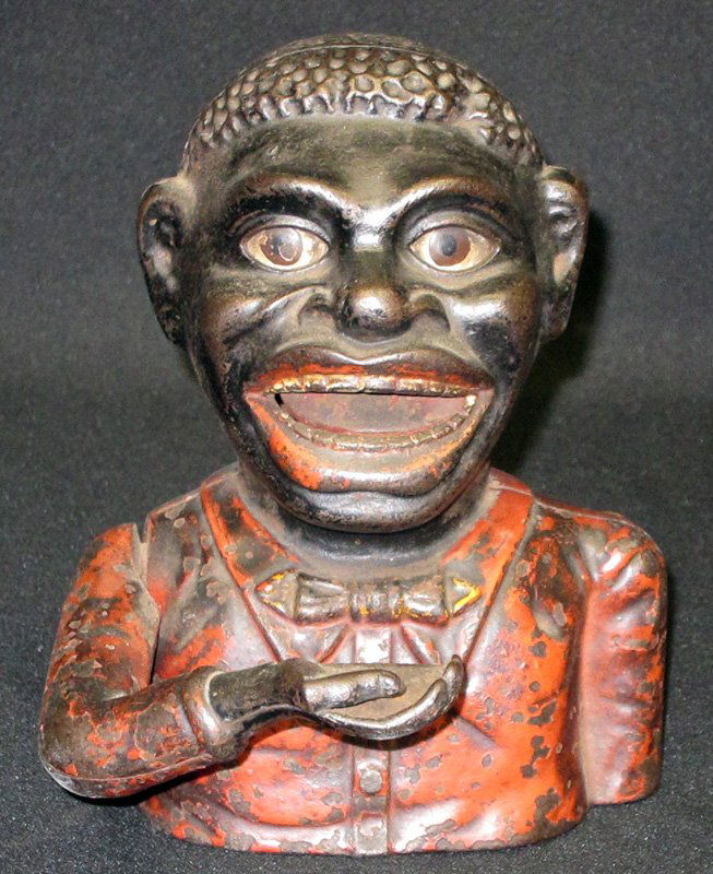 JOLLY N MECHANICAL BANK: painted cast iron; original paint; Shepard Hardware; paint worn and chipped; H-6 1/2", F