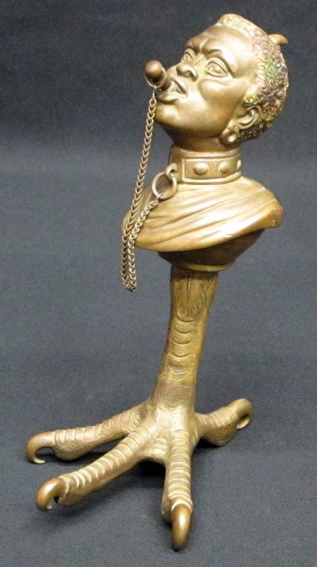 FIGURAL SLAVE CIGAR LIGHTER: Cast brass black bust in collar, on eagle foot; H-9", G-VG