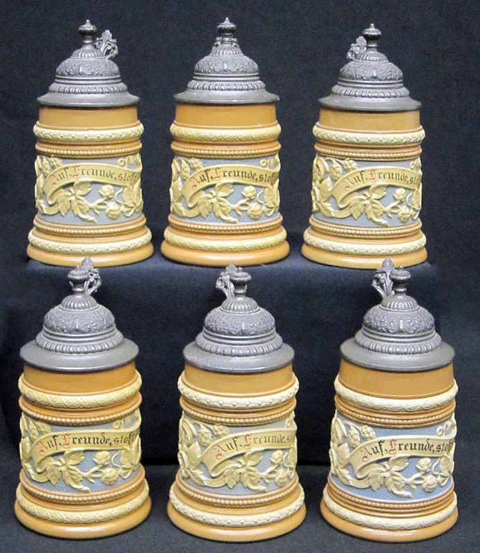 METTLACH STEINS (6) - 1/4 L: Painted ceramic with relief decoration; pewter top; #1740; H-7", VG-EX
