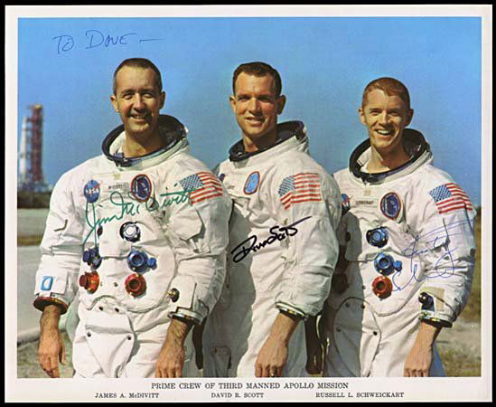 1969 CREW SIGNED PORTRAIT LITHO: Original NASA 8"x10" color crew portrait litho signed by entire crew. Jim McDivitt has signed in green Sharpie, David Scott in black marker and Rusty Schweickart in blue ink pen. Schweickart has inscr