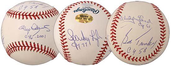 YANKEE CY YOUNG WINNERS SIGNED BASEBALL: An OML (Selig) hand-signed baseball by five different Cy Young Award winners - the only Yankee pitchers to win this award. The Cy Young Award began in 1956 as the award for the best pitcher in the maj