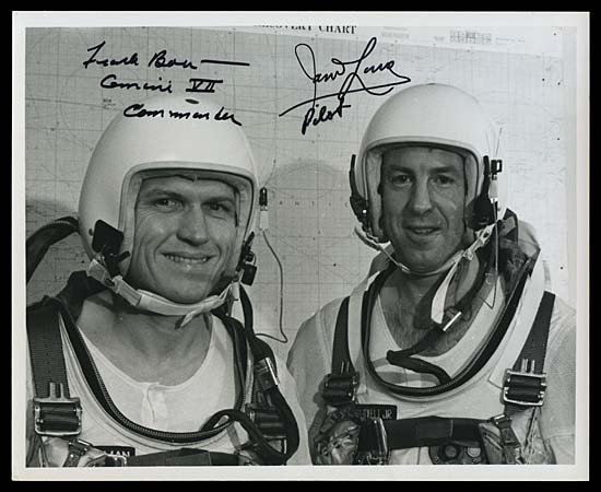 1965 CREW SIGNED PHOTO: A black & white 8"x10" photograph, hand-signed in black sharpie by Gemini 7 Astronauts Frank Borman and James Lovell. Very fine.