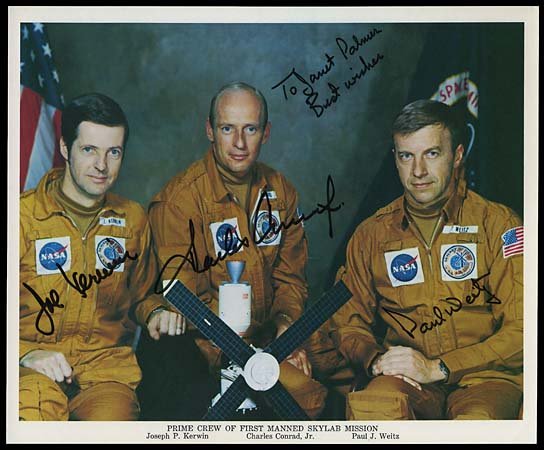 1973 SKYLAB-2 CREW SIGNED LITHO: Original NASA issued color litho (8"x10") showing the crew of the first manned Skylab Mission. Litho signed in black sharpie by Astronauts Charles Conrad, Joe Kerwin & Paul Weitz. Weitz has added: 'To
