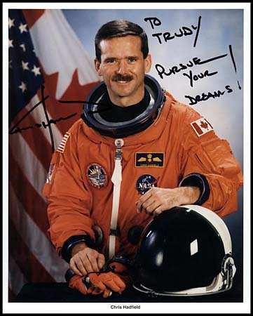 c.1980s CANADA 'TRUE NORTH' ASTRONAUTS: Lot contains eight 8"x10" color lithograph portraits autographed by individual Canadian Astronauts. Astronauts include: Bjarni Tryggvason, Bob Thirsk, Steve Maclean, Marc Garneau, Ken Money, Roberta B