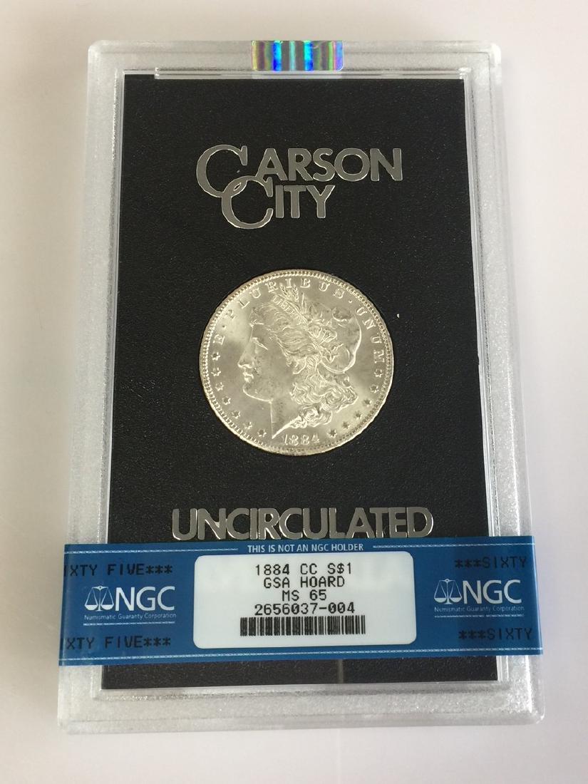 A Gem Uncirculated 1884-CC GSA Morgan Dollar Graded NGC (1 of 2)