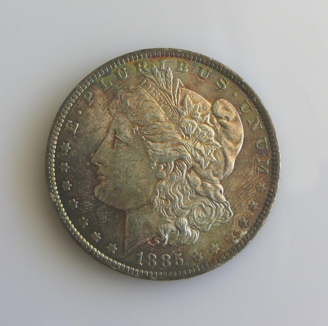 1885 O Gem Uncirculated Rainbow Toned Morgan Silver (1 of 2)
