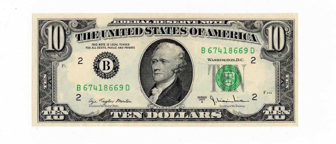 1977-A Ten $10.00 Dollar Error Note -Missing Design: A nice crisp uncirculated 1977-A Ten $10.00 Dollar Error Note -Missing Design. Obviously - a piece of debris was on the plate when this note was printed. A very cool error that is harder to find than