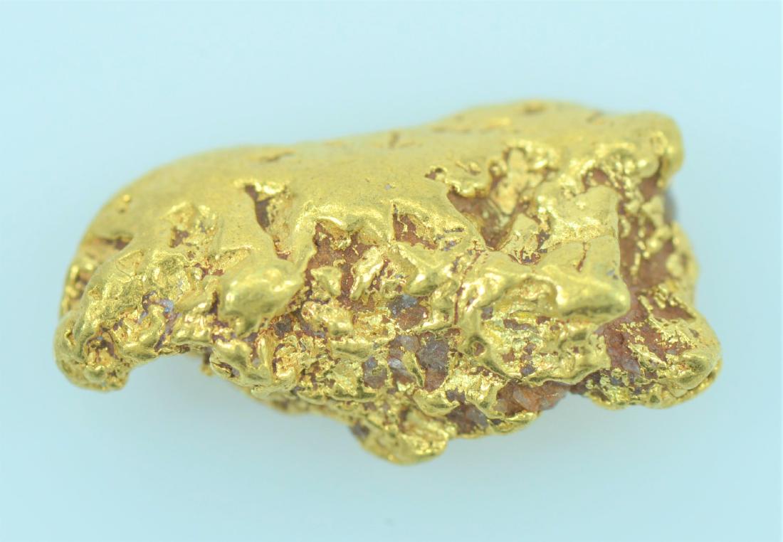 Gold Nugget: 20.5K to 22K purity gold nugget totaling 4.2 grams.