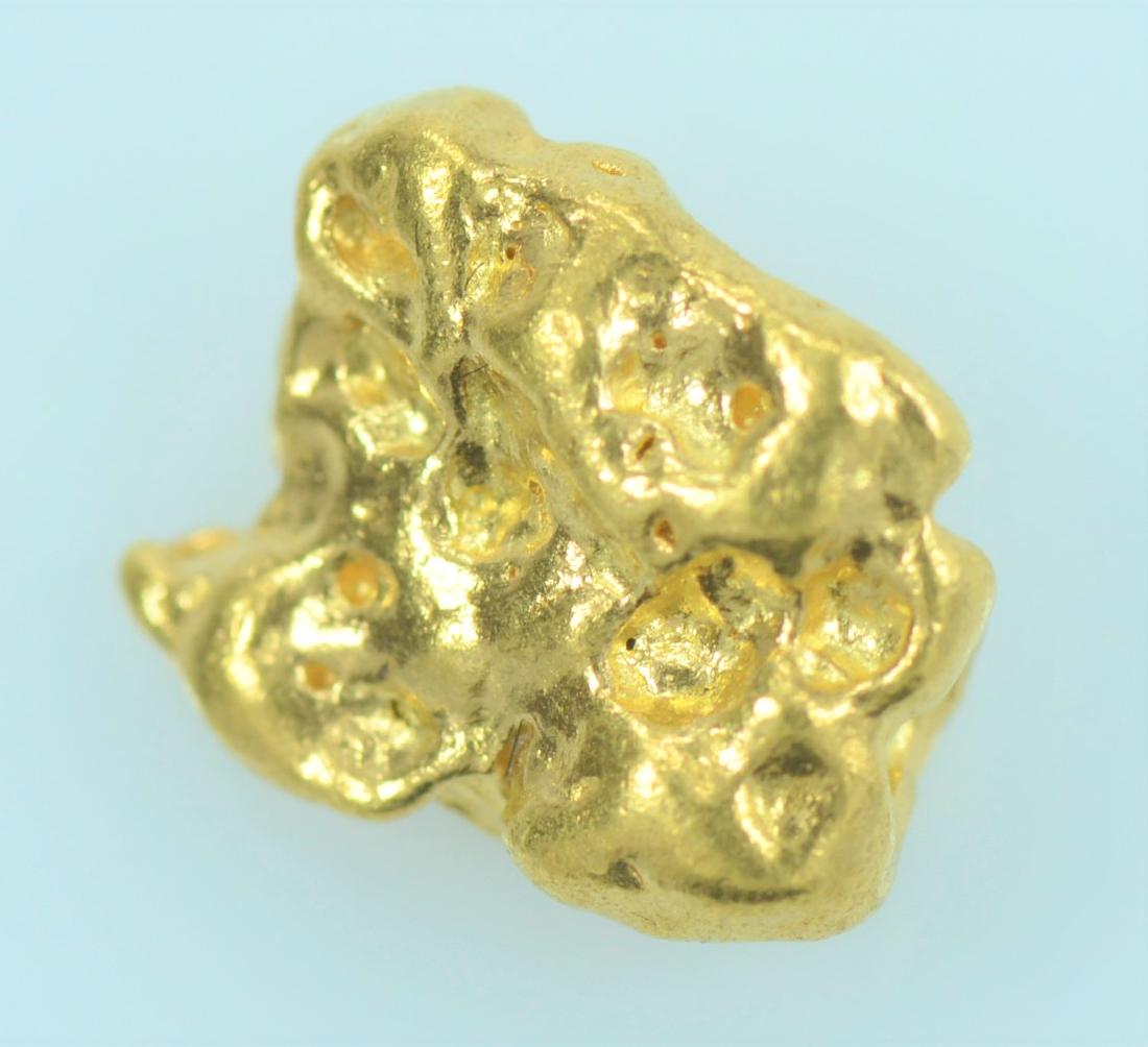 Gold Nugget: 20.5K to 22K purity gold nugget totaling 1.5 grams.