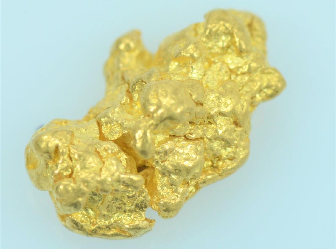 Gold Nugget: 20.5K to 22K purity gold nugget weighing 1.5 grams.