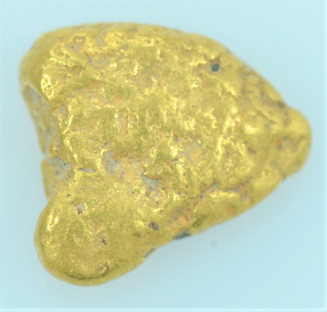 Gold Nugget: 20.5K to 22K purity gold nugget weighing 1.2 grams.