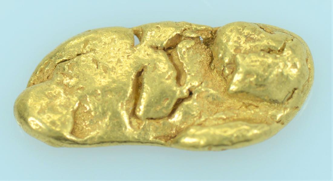 Gold Nugget: 20.5K to 22K purity gold nugget weighing 1.2 grams.