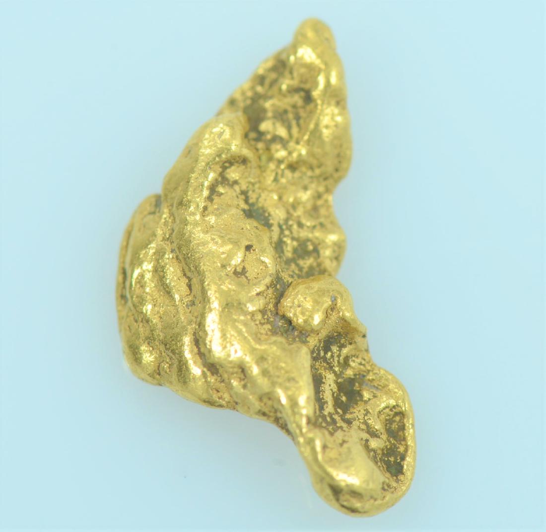 Gold Nugget: 20.5K to 22K purity gold nugget weighing 1.2 grams.