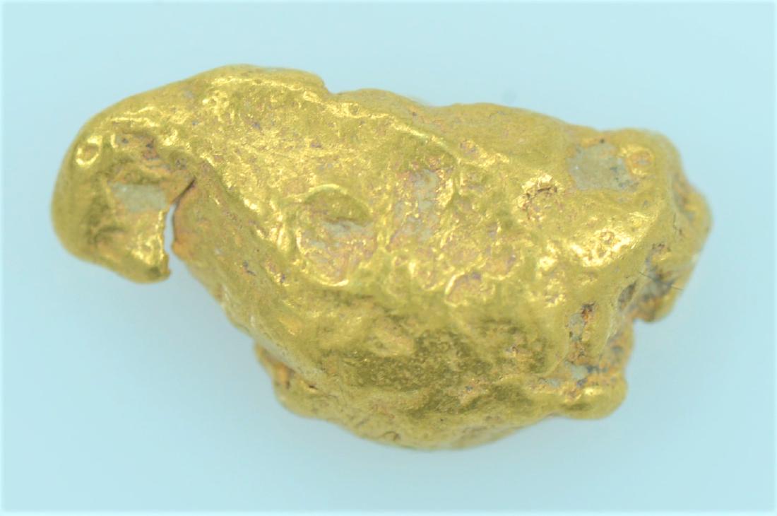 Gold Nugget: 20.5K to 22K purity gold nugget weighing 1.9 grams.