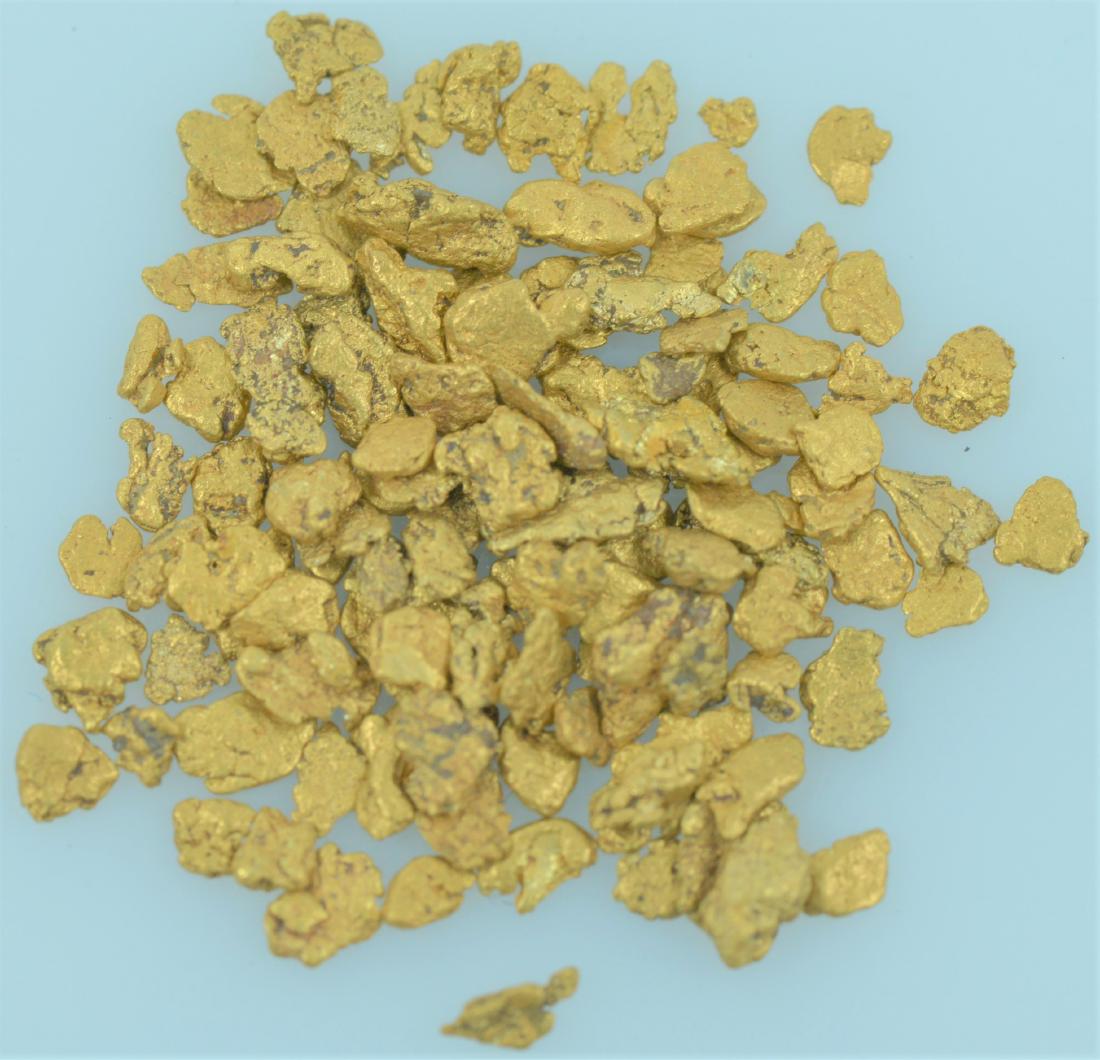 Gold Nuggets: Bag of 20.5K - 22K purity gold nuggets weighing 2.0 grams total.