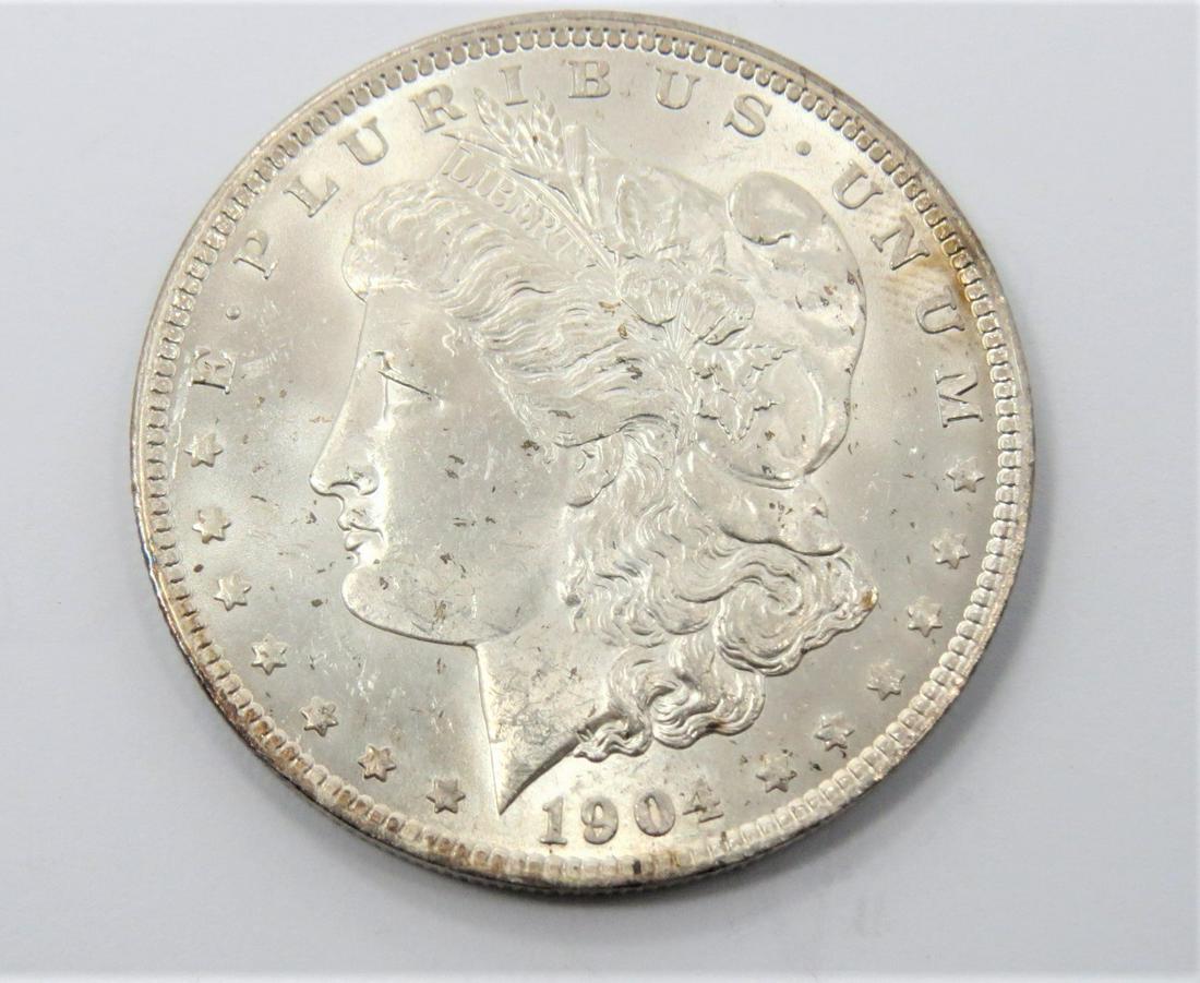 1904 O MORGAN SILVER DOLLAR (1 of 2)