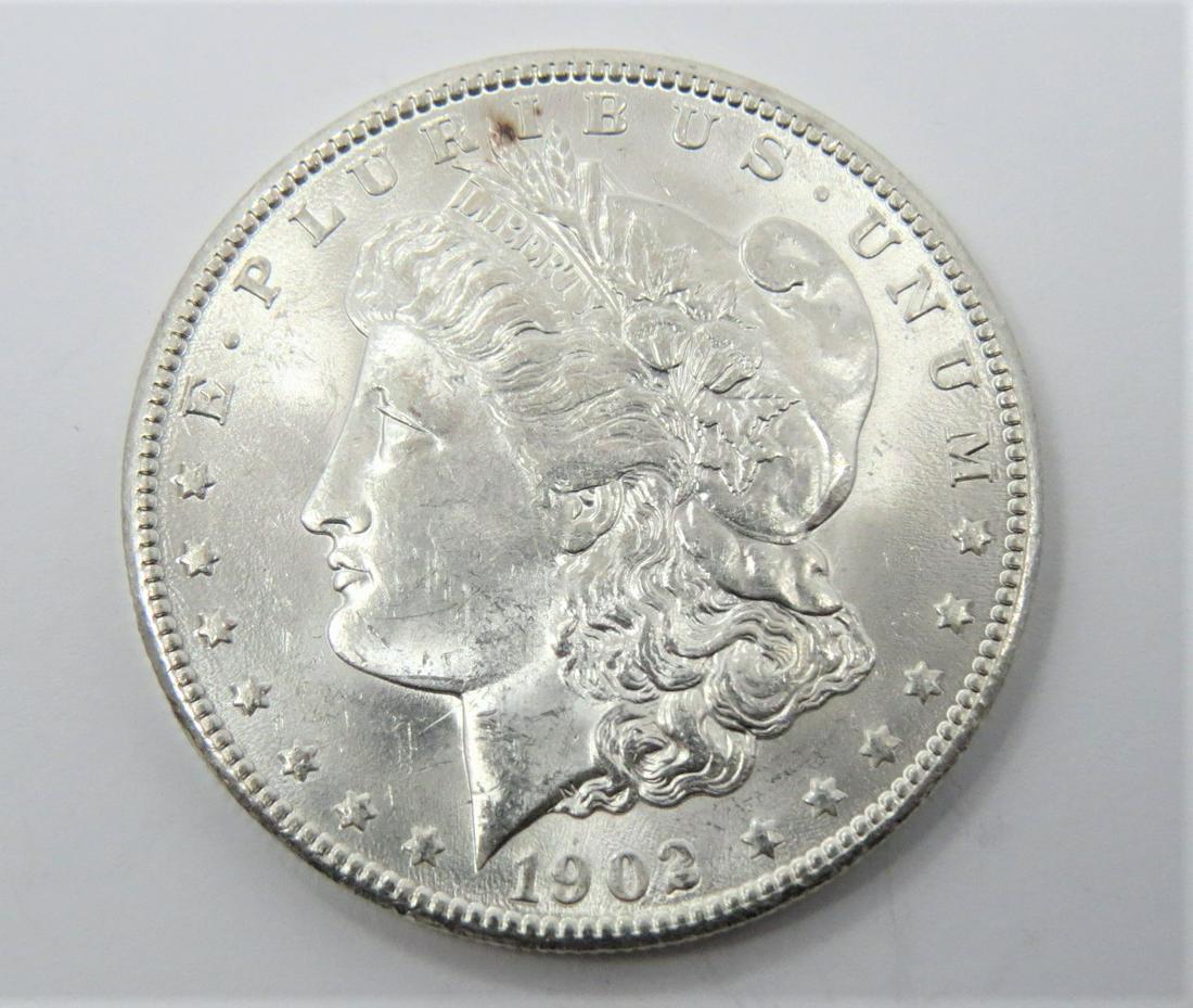 1902 O MORGAN SILVER DOLLAR (1 of 2)