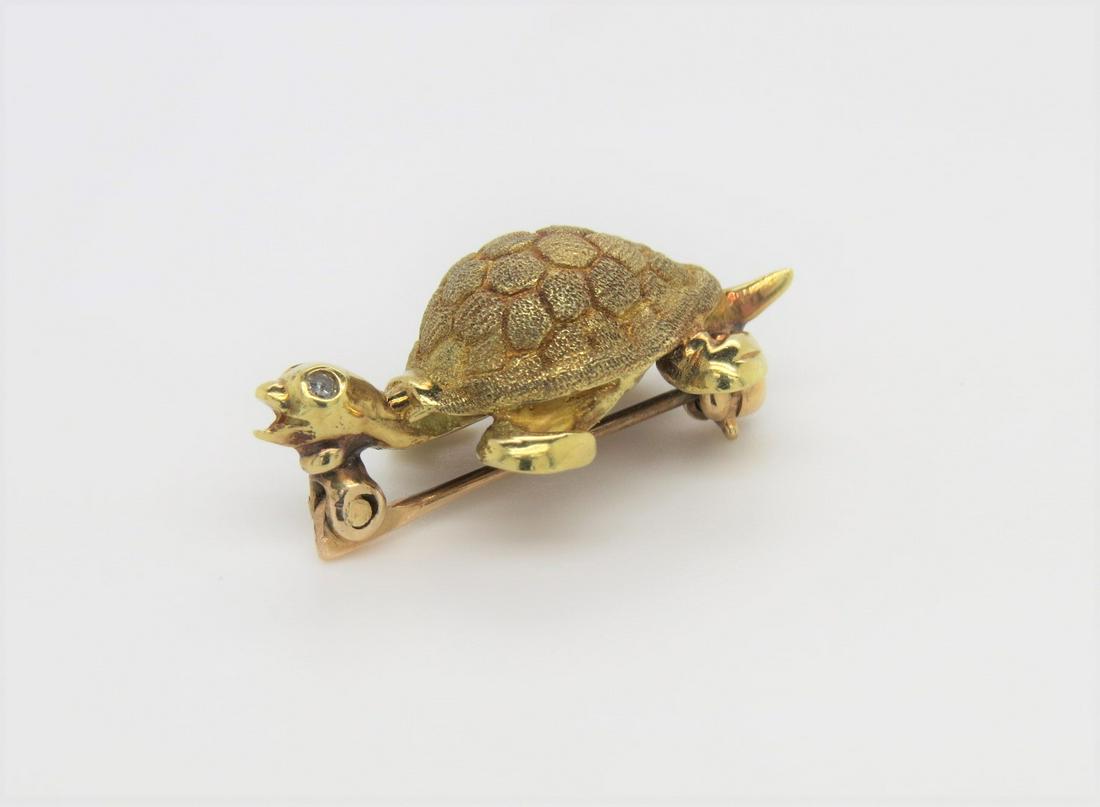 18K Yellow Gold and Diamond Vintage Turtle Brooch: Stamped 18K yellow gold vintage turtle brooch set with single cut round diamond eyes. Stone textured shell. Brooch measures 23 mm x 12.5 mm. Weighs 4.5 grams.