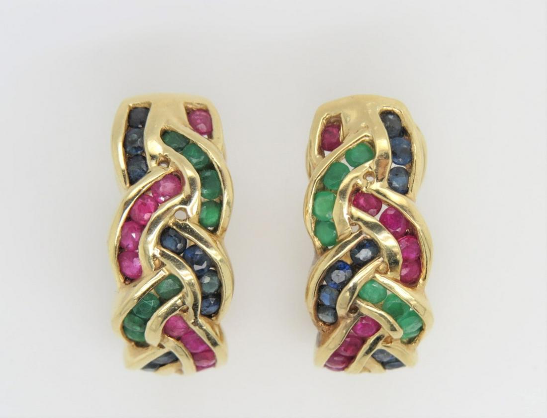 14K Yellow Gold Ruby Sapphire & Emerald Earrings: 14K yellow gold, sapphires, rubies and emerald earrings. Approximately 0.50 cts of emeralds, 0.50 cts of sapphires and 0.50 cts of rubies. Round stones, all channel set. Lever backs. 19.4 mm x 8 mm. 5