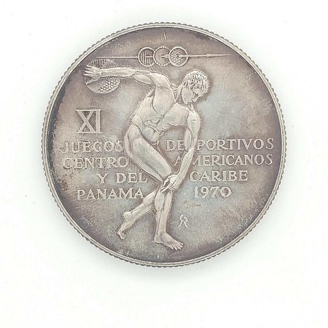 1970 Panama Silver 5 Balboa Caribbean Games KM28: A 1970 Panama Silver 5 Balboa Caribbean Games KM28. Over 1 ounce of net silver in this larger .925 Panama Crown.