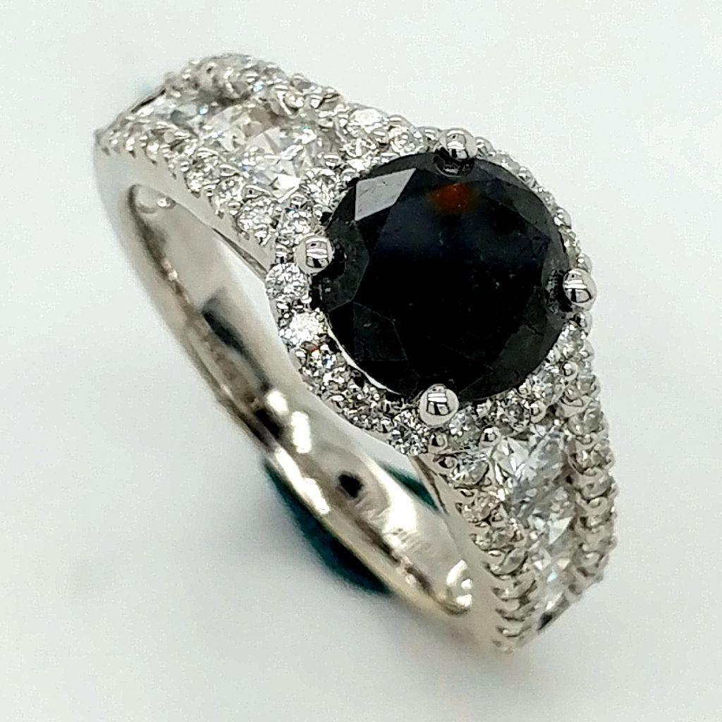 Certified 14K White Gold Black Diamond Ring: Certified and appraised 14K white gold black and white diamond unity ring. Th featured black diamond is set within a diamond bezel. Center black diamond is approximately 1.85 ct total weight. Fifty-ei