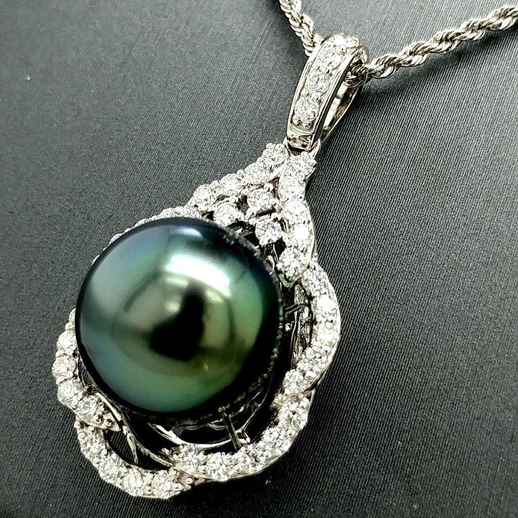 Certified Platinum Tahitian Pearl &Diamond Pendant: Certified and appraised platinum, Tahitian pearl and diamond pendant with necklace. Genuine cultured Tahitian pearl and 41 genuine round diamonds, weighing approximately 0.99 cts. Platinum rope chain 