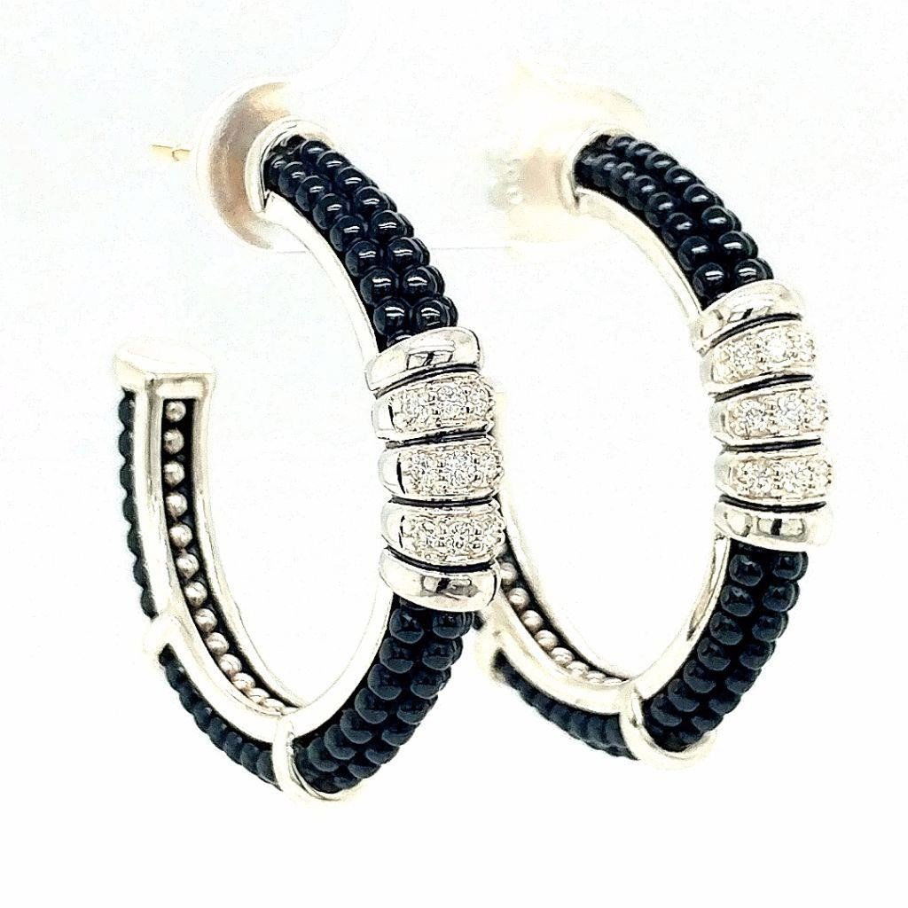 Lagos Black Caviar Diamond Hoop Earrings: LAGOS Black Caviar Diamond Hoop Earrings. Sterling silver with black ceramic beads. White diamond pavÃ© center accents. 0.25 total diamond carat weight that are approximately G, VS1. Approximately 1