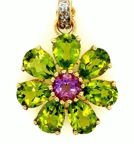 14K YG Peridot & Amethyst Pendant: This is a 14kt yellow gold peridot pendant with a round amethyst center stone and a hinged diamond bail. The pear-shaped peridot are approximately 5mm x 7mm each. The light purple, round, center ameth